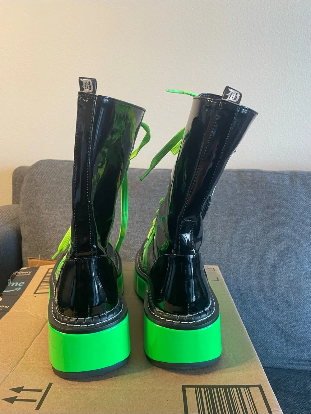 Demonia Women’s Black Lace-Up Platforms with Neon Green Accents